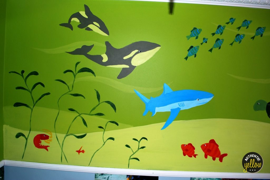 Detail of the mural - killer whale, shark, school of fish, shrimp